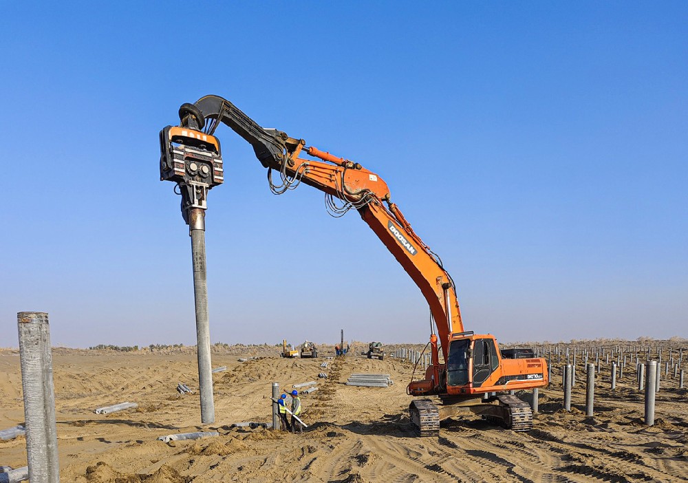 Construction of large-flow water jet guided hole round pile driving